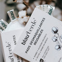 Un paquete de pads contiene 5 piezas. Cada pad tiene dos distintos lados, una de tela suave y otra de tela medio-suave.